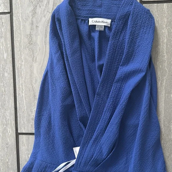 Calvin Klein high low size 6 blue dress. Halter style. - Picture 2 of 4